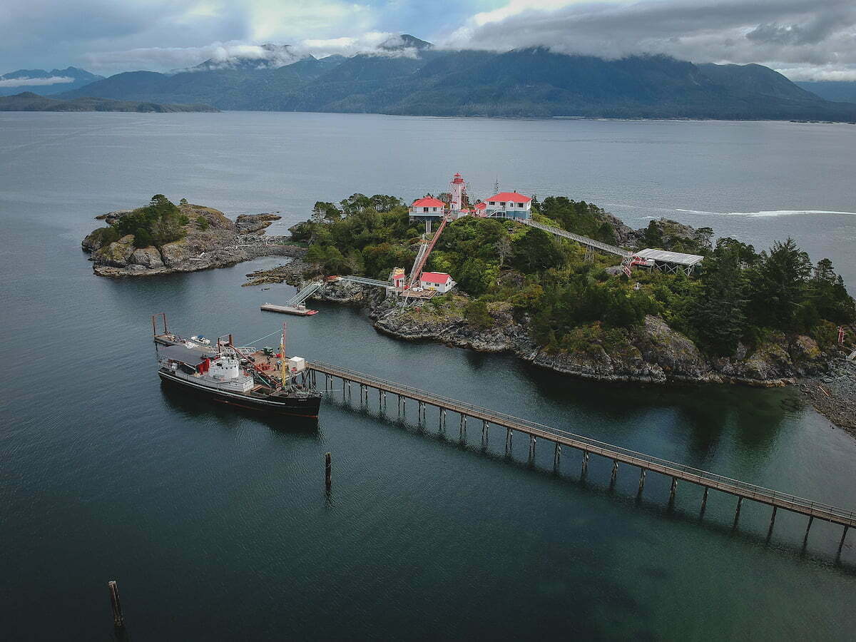 Friendly Cove aerial views with views of the Lighthouse and Uchuck III as a popular day trip from Gold River, BC 