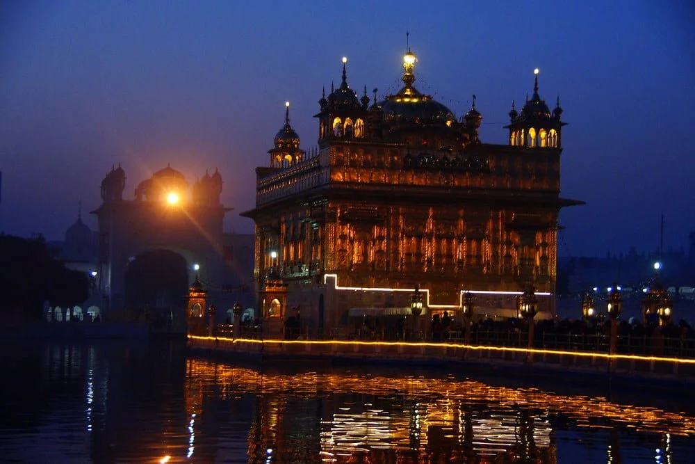 The Harmandir Sahib (Golden Temple) illuminated at night in Amritsar, India