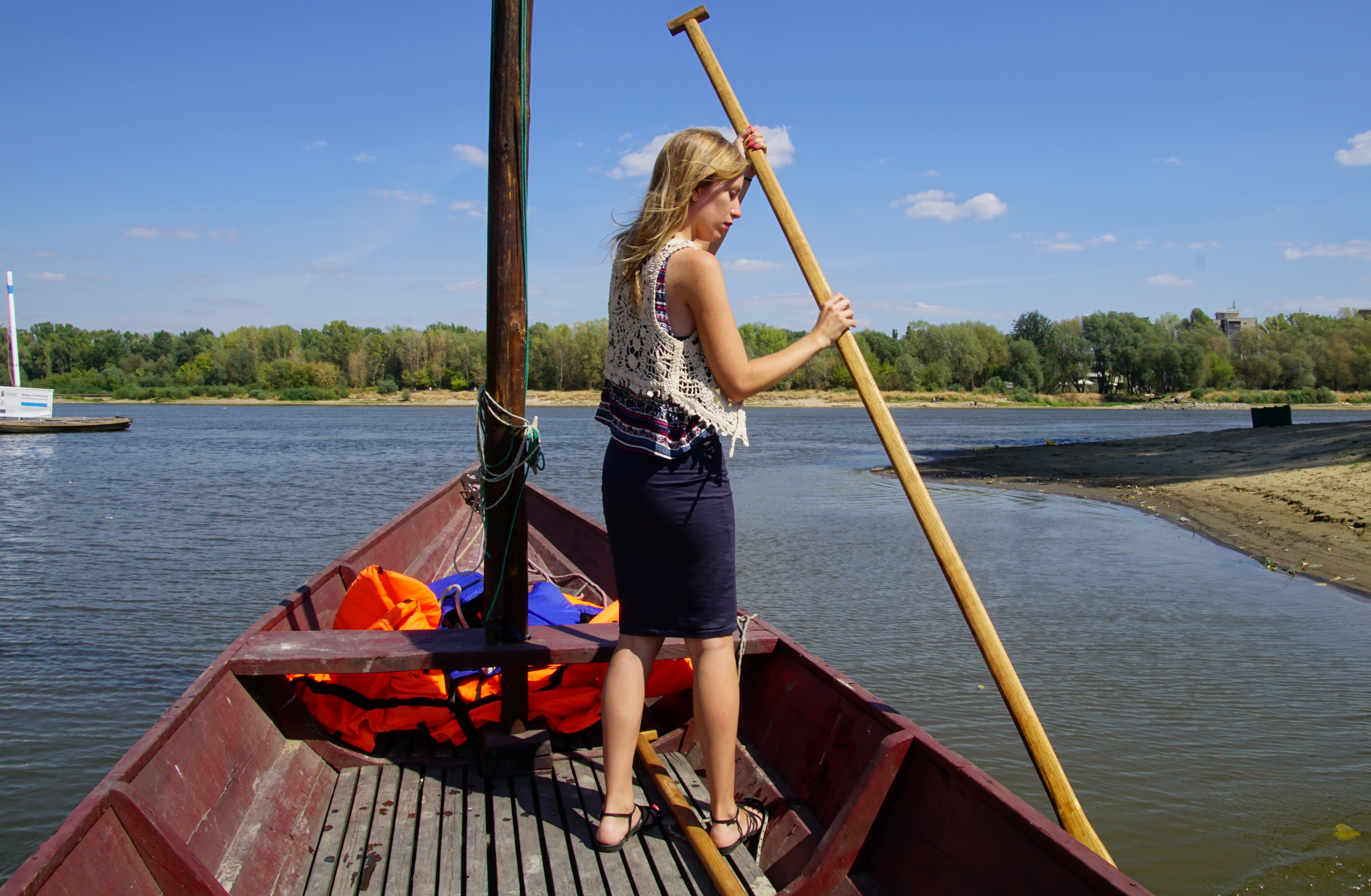 That Backacker Audrey Bergner paddling on a boat in Warsaw, Poland