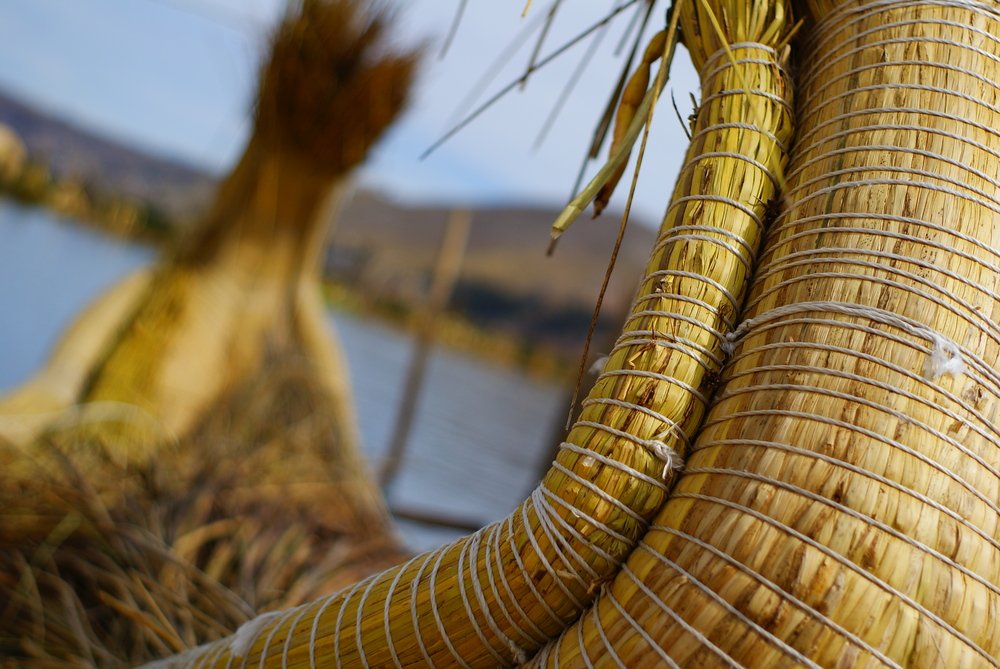 A close-up shot of the totora reed boats made by the Uros people from Lake Titicaca, Peru 