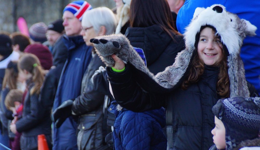 A couple of cute kids waiting along the spectator row for the Loony Dook to begin