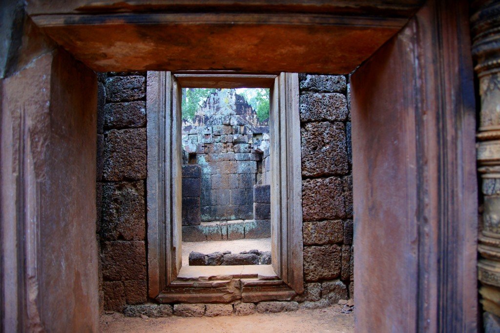 A framed shot through a doorway entrance at Banteay Srei in Cambodia 