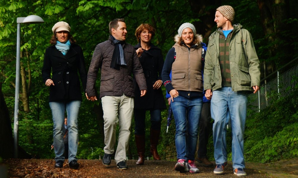 A group of friends enjoying the lovely forest trails on the outskirts of Freiburg, Germany