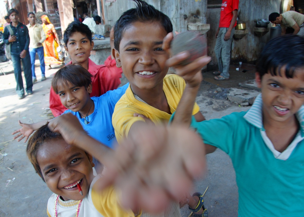 A group of Indian boys are delighted to see me and pose for a group shot while visiting Jaipur, India
