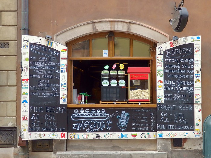 A little restaurant where you can purchase items from the window in Warsaw, Poland