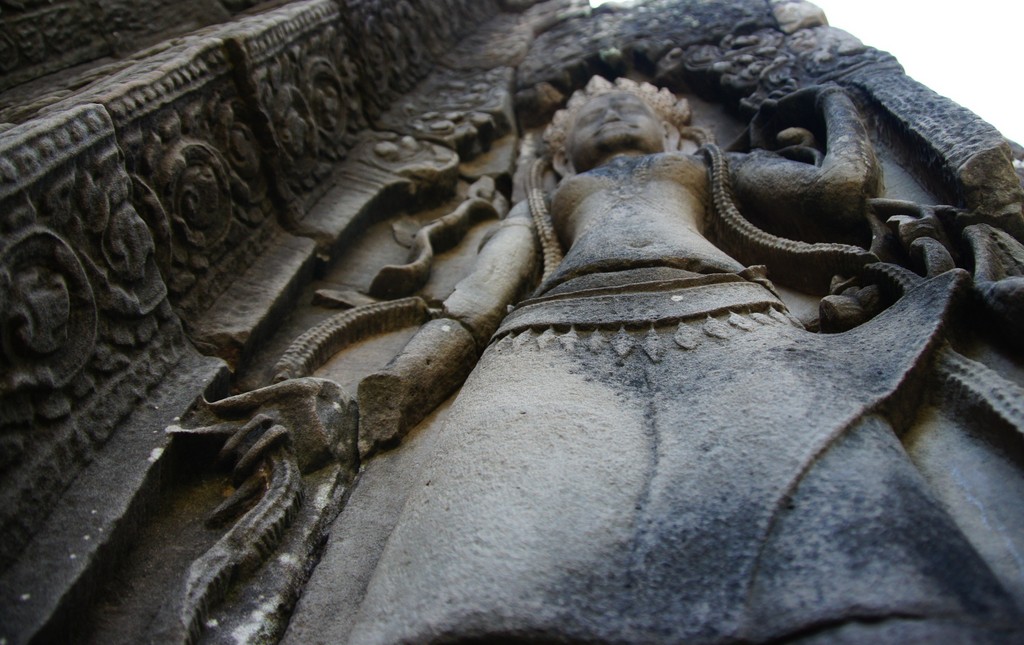 A low angle perspective of the bas-relief sculpture at Bayon, Angkor Thom.