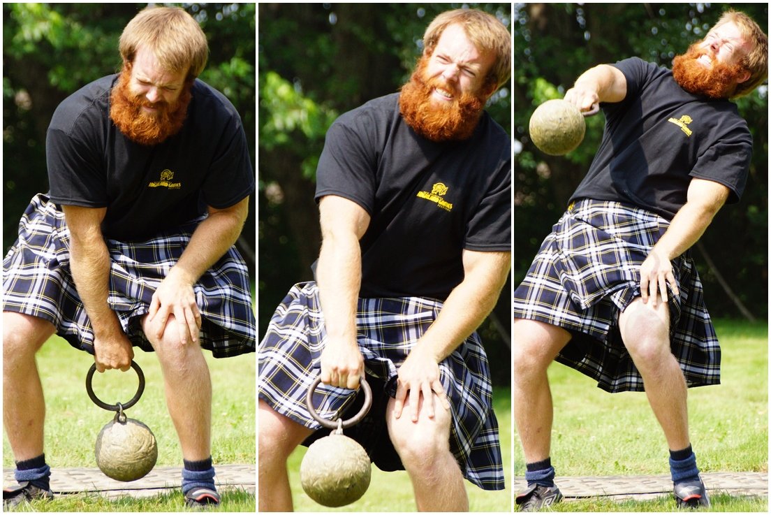 A man with a bushy red beard hurling a weight over his head at the New Brunswick Highland Games in Fredericton 