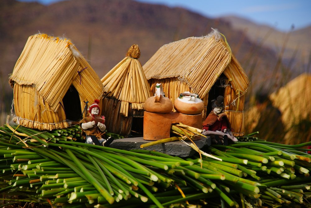 A miniature demonstration of how the Uros people build their floating islands from the totora reeds from Lake Titicaca, Peru 