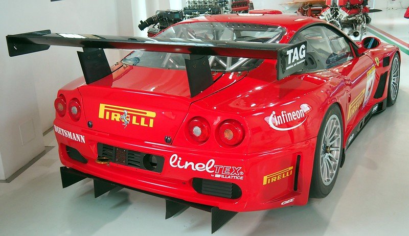 A rear shot of a racing car at the Enzo Ferrari Museum