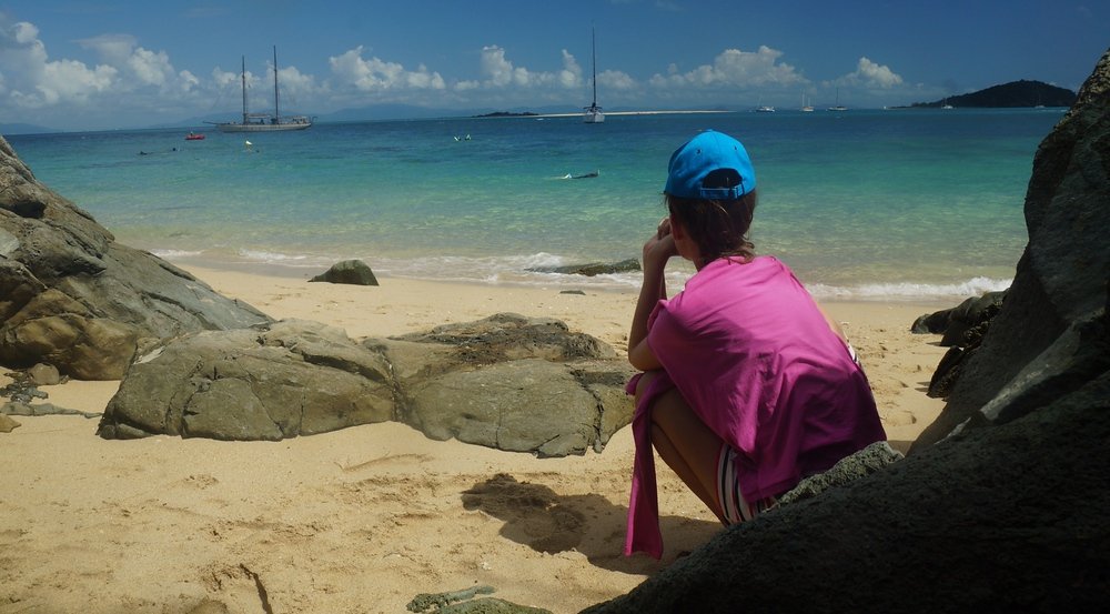 A shot of Audrey admiring the views from a quiet section of the beach