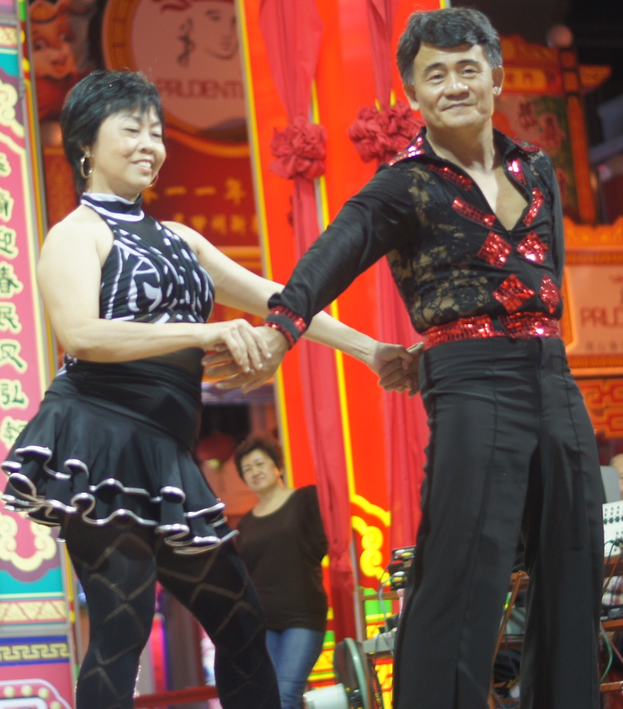 A talented couple perform their dance moves on the largest stage at the end of the Jonker Street Night Market