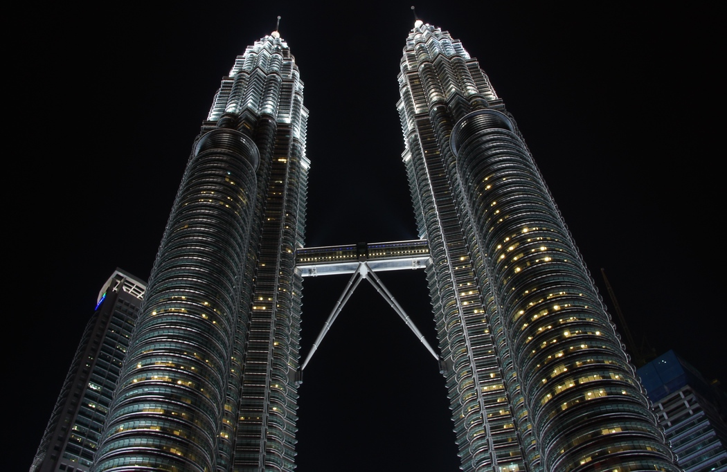 A travel photography tip for taking shots at night is to always carry your tripod which allows you to take longer exposures of the iconic Petronas Towers 