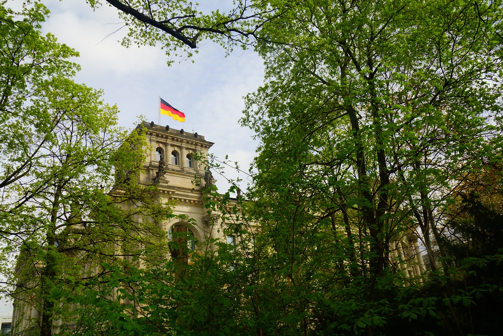 A view of Reichstag as camouflaged by the trees in Berlin