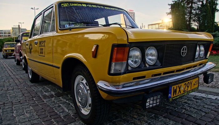 A yellow taxi in Warsaw travel guide