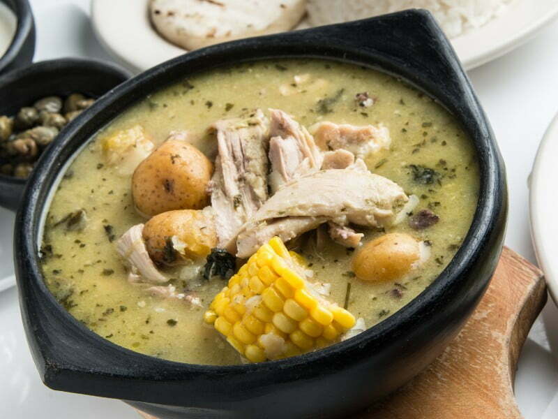 Ajiaco Colombian chicken soup is a must try dish in Bogota, Colombia