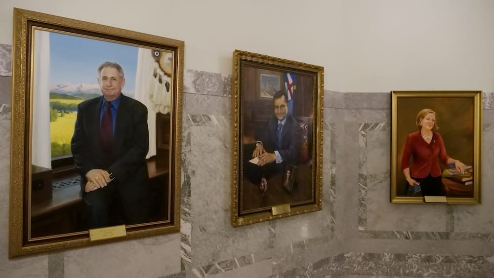 Portraits of former Alberta premiers inside the Alberta Legislature in Edmonton, Alberta, Canada Framed portraits of former Alberta premiers displayed along a marble interior wall inside the Alberta Legislature in Edmonton, Alberta, Canada, adding political history to the building tour.