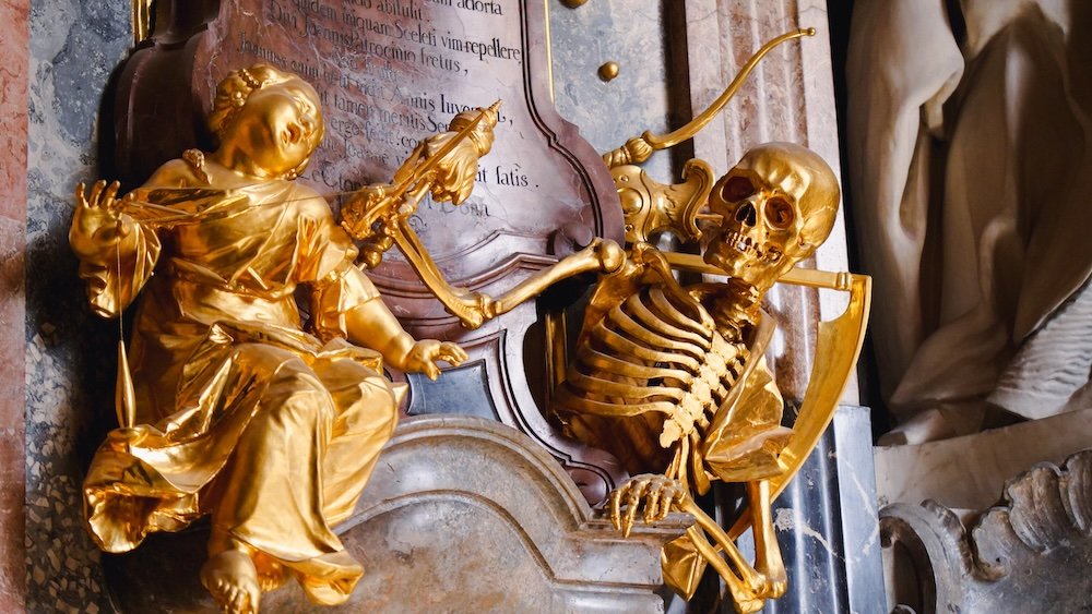 Asam Church Asamkirche golden skeleton in Munich, Germany 