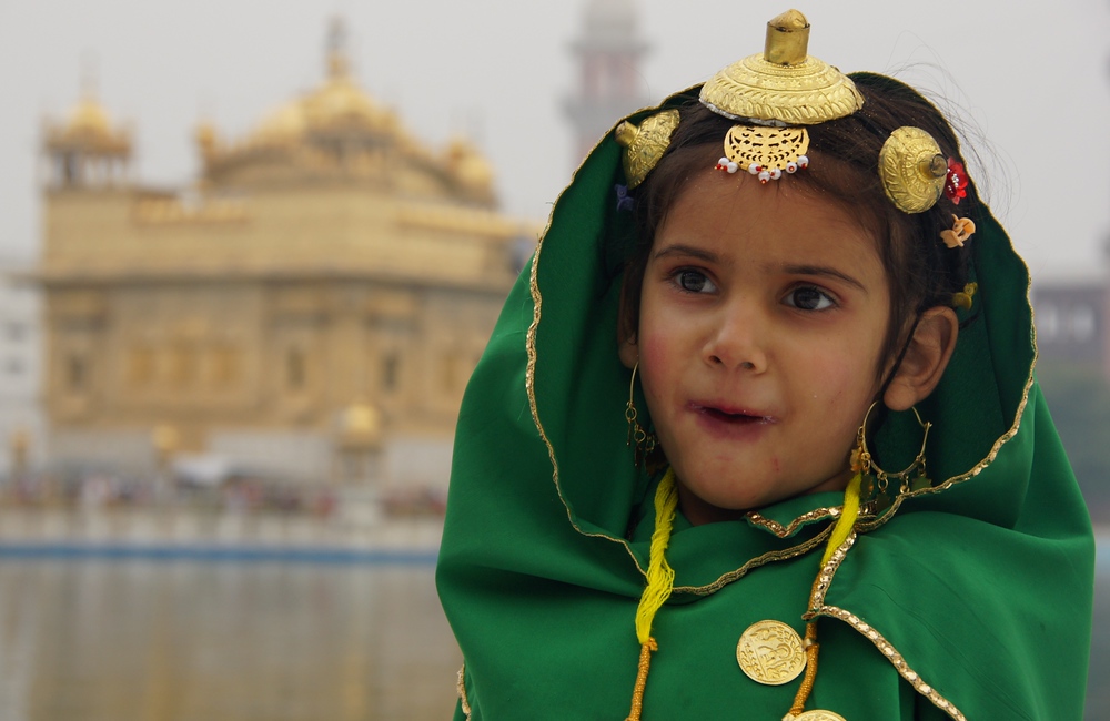 It's the faces that often make a place memorable. While taking in the atmosphere of the Golden Temple I distinctly remember this girl who had glint in her eyes and a shy smile.