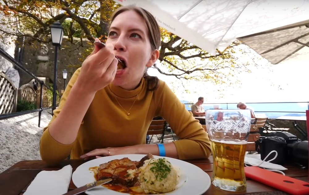 Audrey Bergner That Backpacker eating hearty Austrian food in Salzburg, Austria 