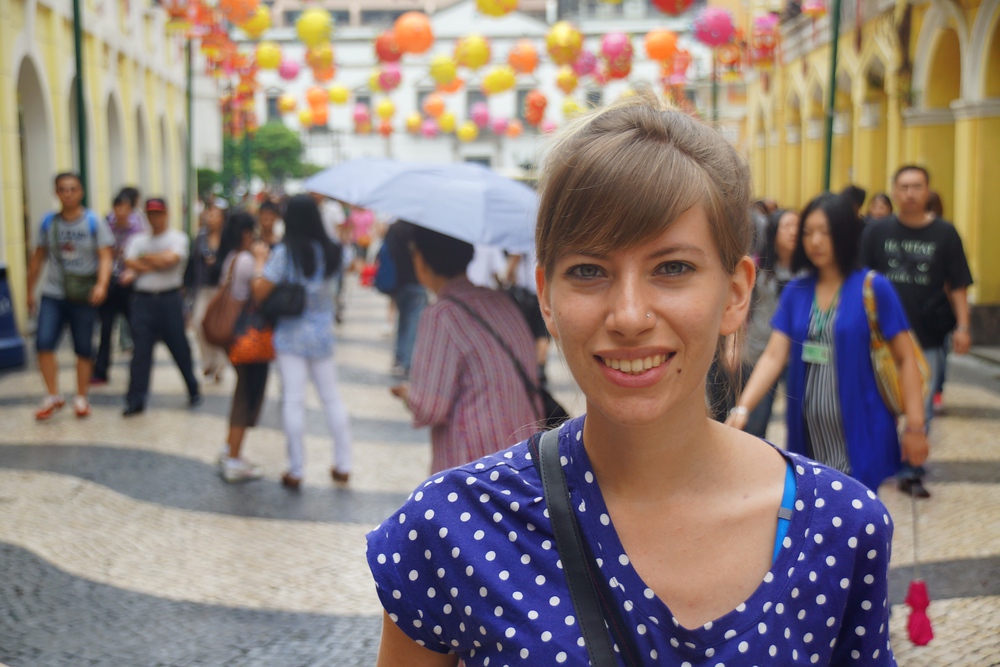 Audrey Bergner That Backpacker posing at Senado Square in Macau, China