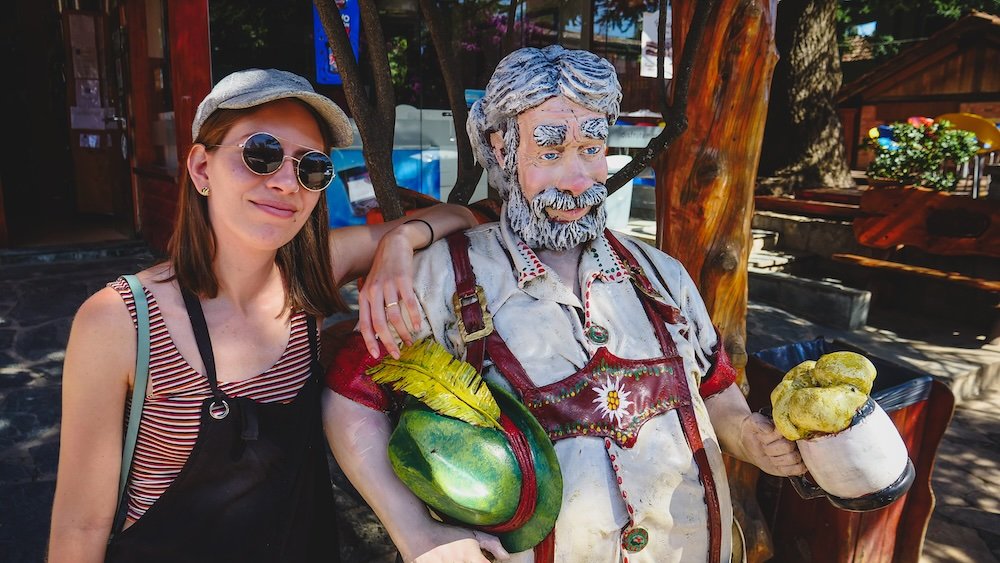 Audrey Bergner That Backpacker posing by a figurine in Villa General Belgrano, Cordoba, Argentina 