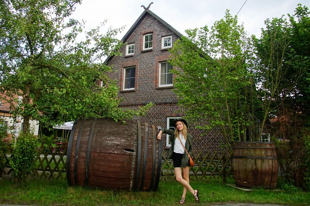 Audrey Bergner That Backpacker posing by a large barrel in Spreewald, Germany