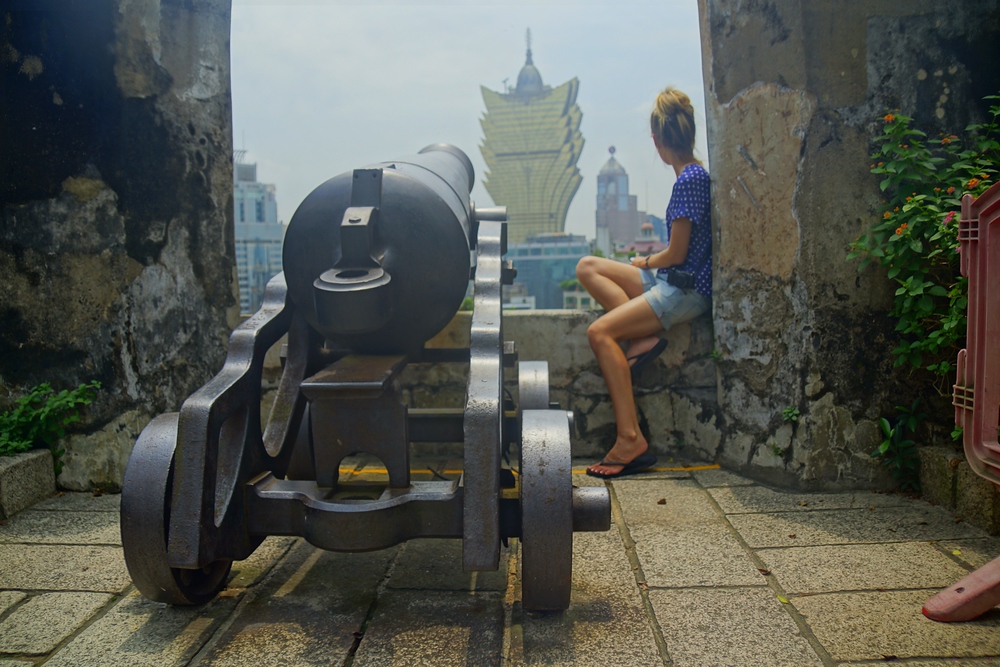 Audrey Bergner That Backpacker posing high atop Mount Fortress in Macau, China