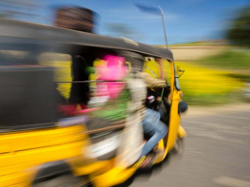 Autorickshaw motion blur is one way you can take local transportation in Agra, India 