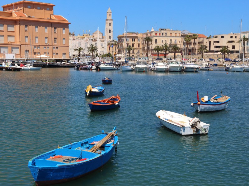 Colorful boats on the water in Bari, Italy 
