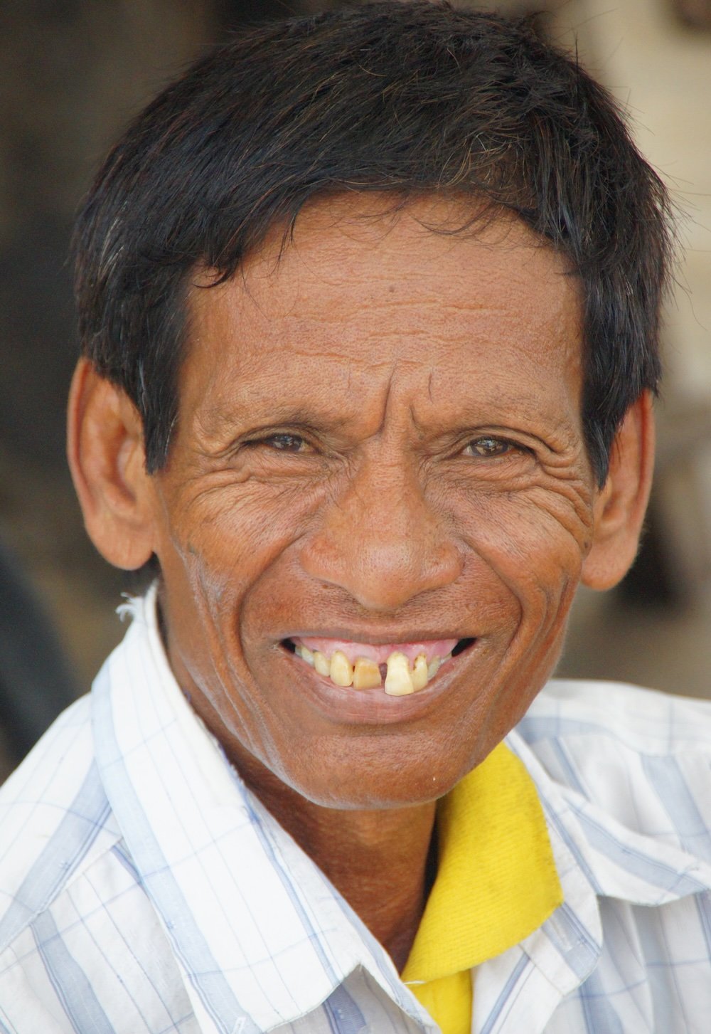 Battambang man with a distinct smile in Cambodia 