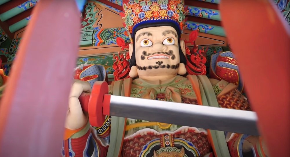 Beomeosa temple deity with sword in Busan, South Korea 