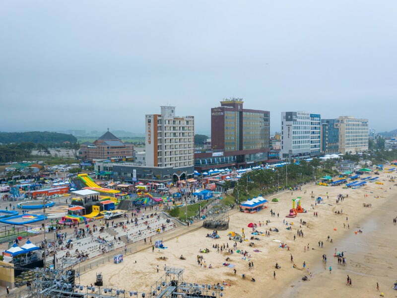 Boryeong Mud Festival at Daecheon Beach in South Korea aerial views 