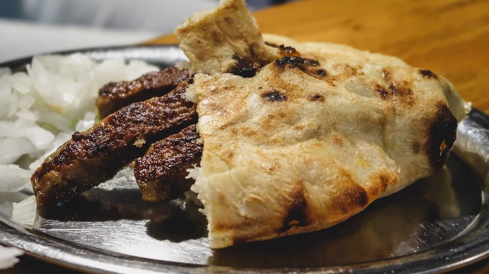 Bread, meat and onions for lunch in Ljubljana, Slovenia 