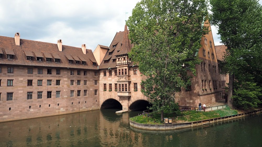 Bridge and Hospital Heilig-Geist-Spital along the Pegnitz River feels like stepping into a medieval painting in Nuremberg, Germany