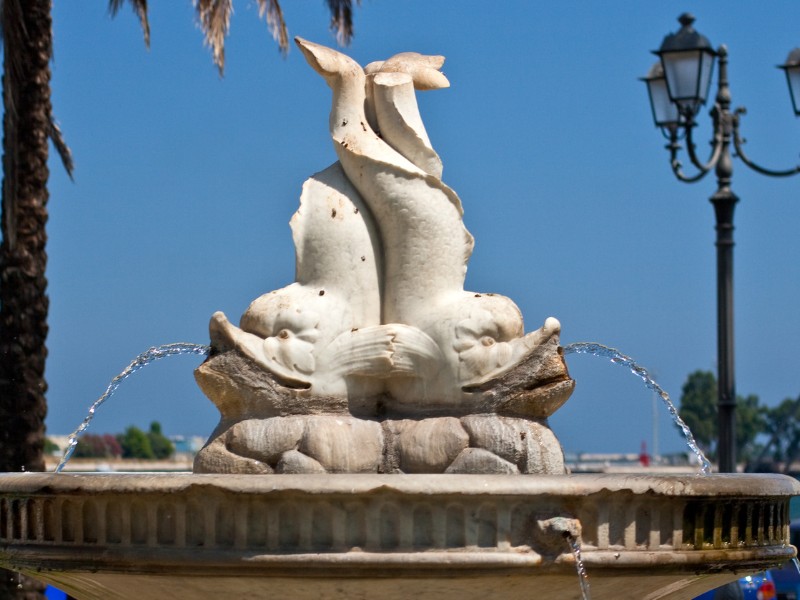 Brindisi fish statue fountain in Italy 