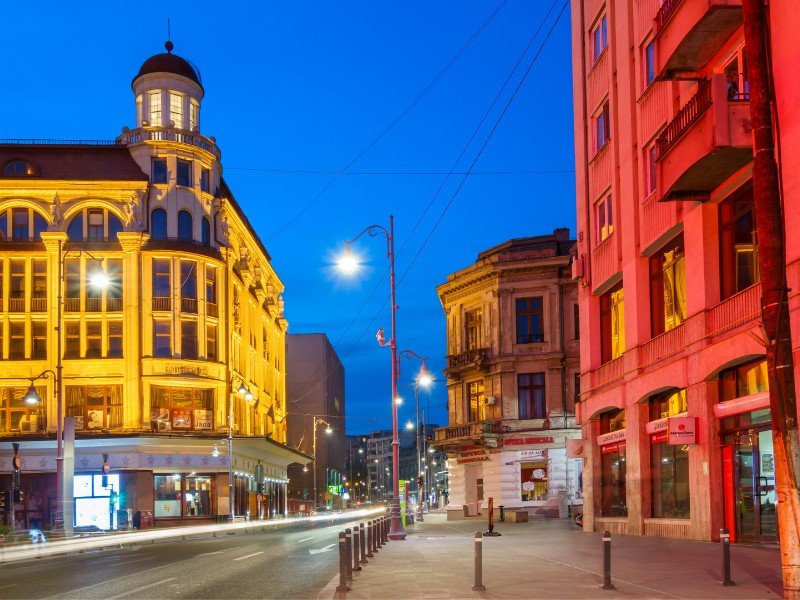 Bucharest colorful buildings during blue hour in Romania 