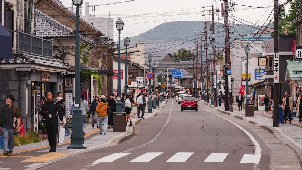 Bustling and busy street scene in the Warehouse District and Glass Shops district of Otaru 