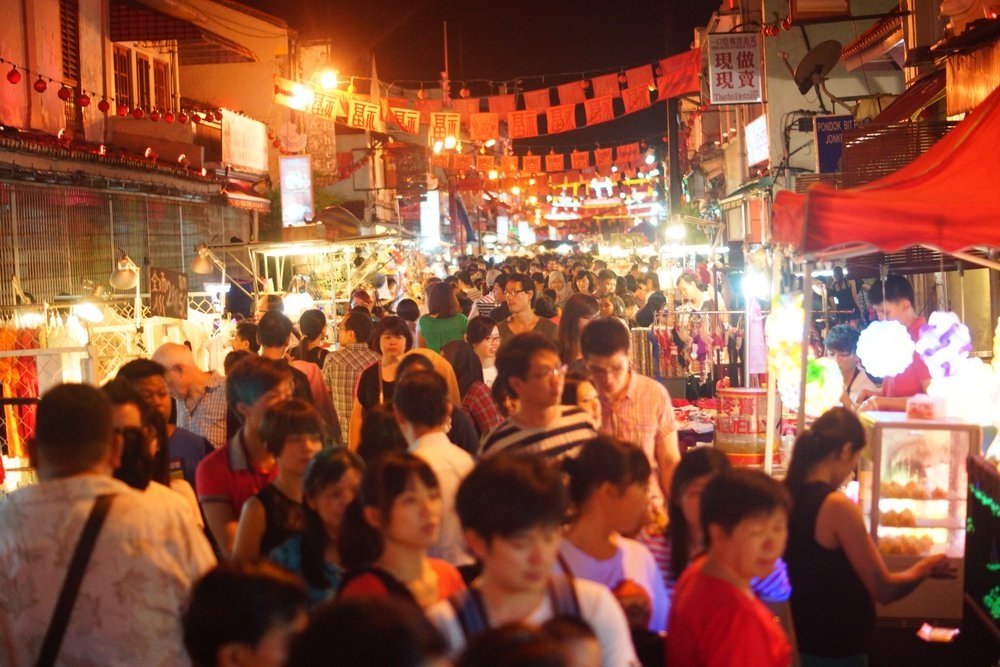 Bustling hive of activity along Jonker Street at the night market in Malacca, Malaysia 