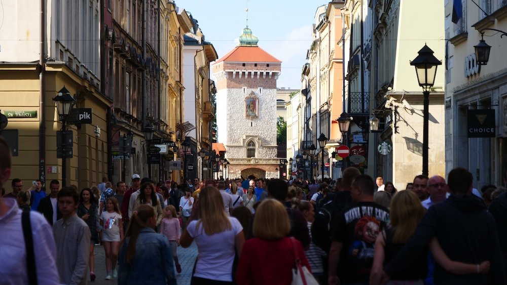 Bustling Krakow scene with pedestrians enjoying the city in Poland 