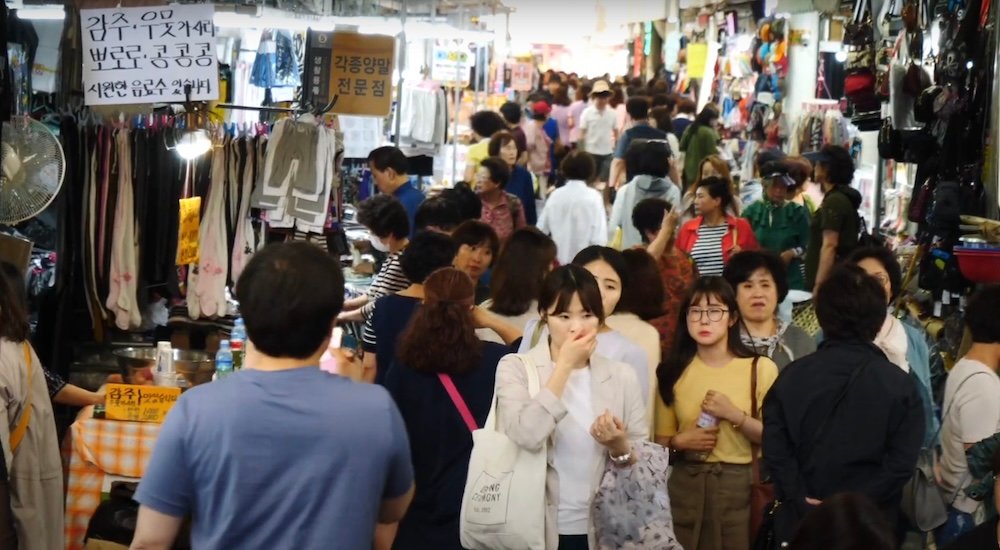 Busy shopping scene with pedestrians in Daegu, Korea 