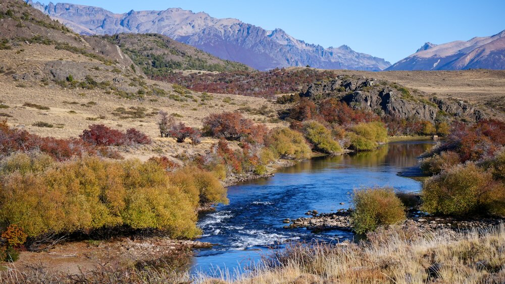Calm Patagonian rivers with gorgeous autumn colours at Estancia Tecka in Patagonia, Argentina 