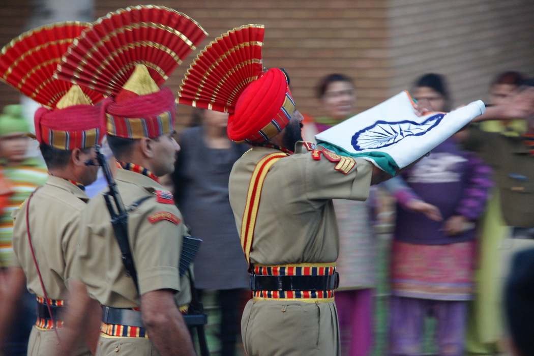 Carrying the Indian flag during the border closing ceremony in Wagah, India