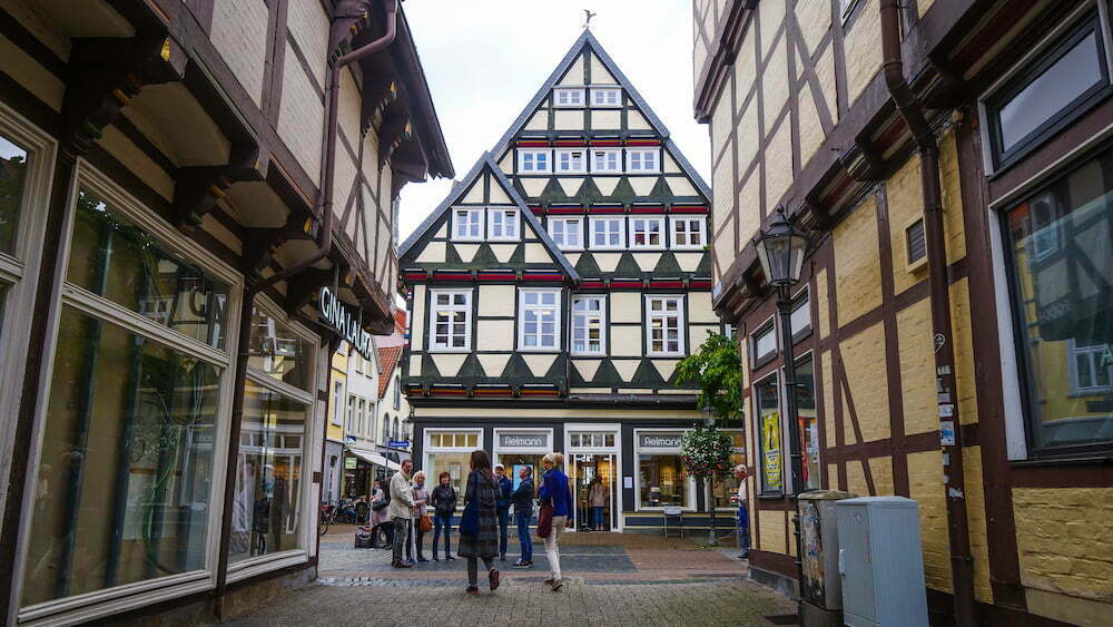Celle street scene walking around half-timbered houses in Germany 