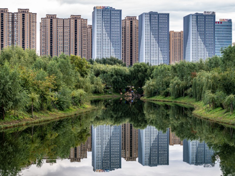 Changchun lake forest and apartment views reflected in the water