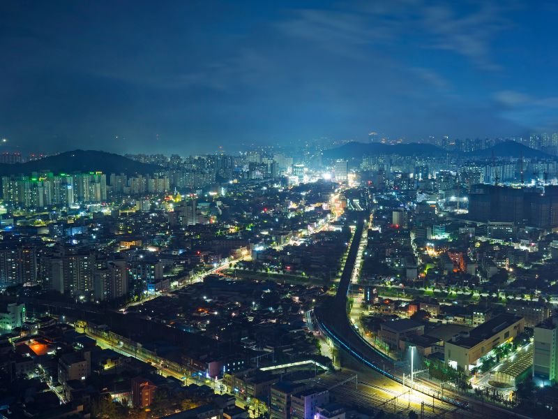 Cheonan city at night from a high vantage point 