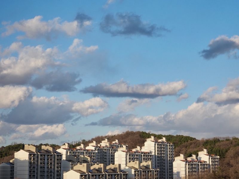 Cheongju apartment buildings and overhead clouds in the sky 