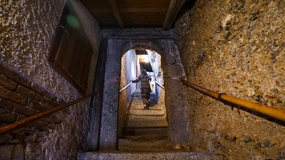 Climbing the steps in the catacombs in Salzburg, Austria 