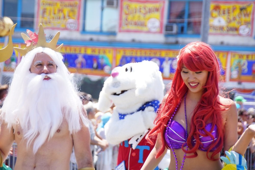 Coney Island Mermaid Parade with someone wearing a Zeus costume 