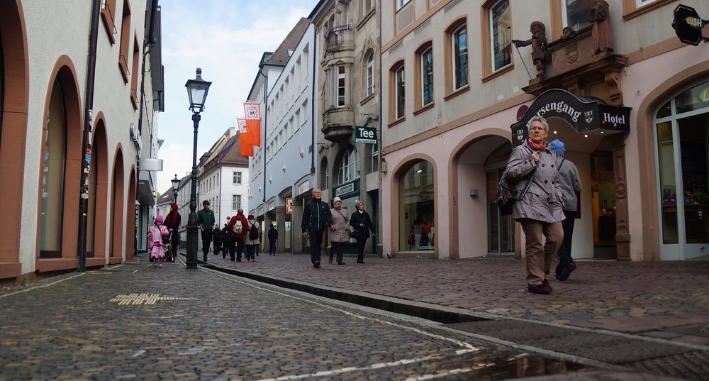 Considering it was a holiday and rainy outside there were a surprising amount of people pounding the pavement in Freiburg, Germany