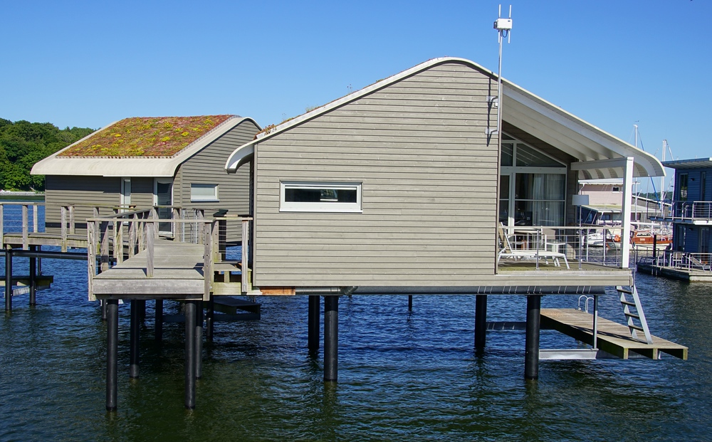 Cool stilt-house apartments for rent with scenic views and open door access to the water on Ruegen Island, Germany